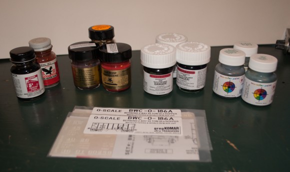 Will we miss the bottle of Fluquil and Polyscale on the left? Maybe not with three bottle of P-B-L Star Brand, two bottles of Scalecoat II, three bottles of Tru-Color on the right to work with. But the Greg Komar Dry Transfers in front, will be missed!.